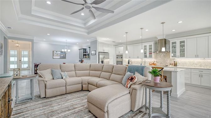 Chandelier, Interior, Kitchen, Living room, Pendant Lights, Recessed Lighting, Stainless Steel Appliances, Wood Texture Flooring