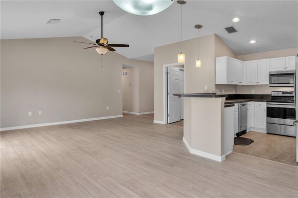 Interior, Kitchen, Pendant Lights, Recessed Lighting, Stainless Steel Appliances, Wood Texture Flooring