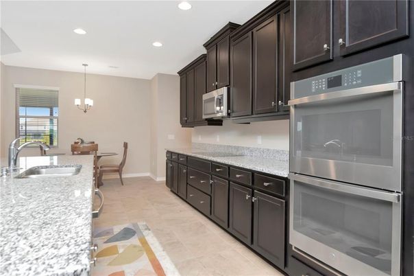 Chandelier, Dining room, Interior, Kitchen, Pendant Lights, Recessed Lighting, Stainless Steel Appliances