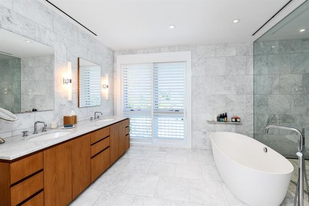 Bathroom, Dual Sink Vanities, Free Standing Baths, Glass Shower, Interior, Marble, Marble Walls, Recessed Lighting