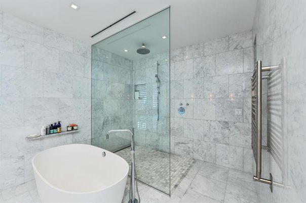 Bathroom, Free Standing Baths, Glass Shower, Interior, Marble Walls, Recessed Lighting