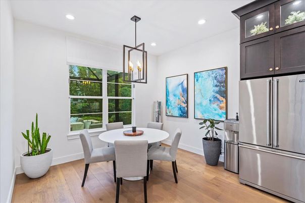 Dining room, Interior, Kitchen, Pendant Lights, Recessed Lighting, Stainless Steel Appliances, Wood Texture Flooring