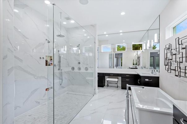Bathroom, Dual Sink Vanities, Glass Shower, Interior, Marble, Marble Walls, Recessed Lighting