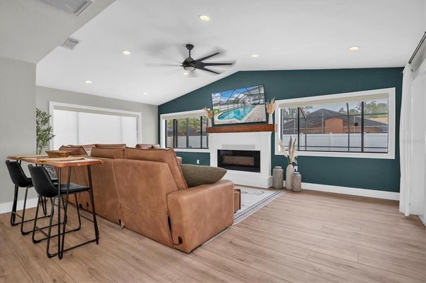 Fireplace, Interior, Living room, Recessed Lighting, Wood Texture Flooring