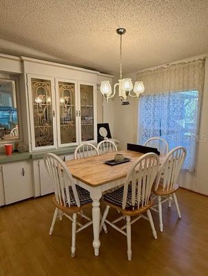 Chandelier, Dining room, Interior, Pendant Lights, Wood Texture Flooring