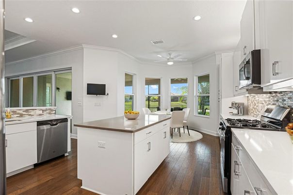 Dining room, Interior, Kitchen, Recessed Lighting, Stainless Steel Appliances, Wood Texture Flooring