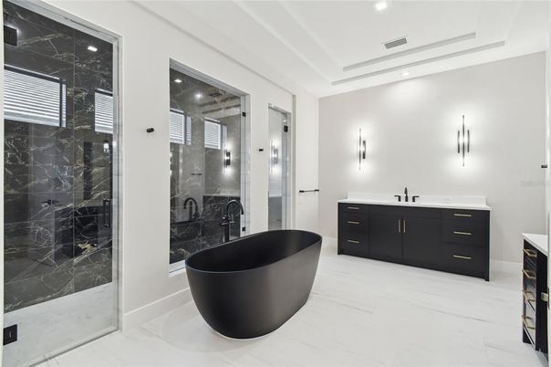 Bathroom, Dual Sink Vanities, Free Standing Baths, Glass Shower, Interior, Marble, Marble Walls, Recessed Lighting