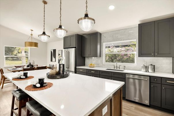 Dining room, Interior, Kitchen, Pendant Lights, Recessed Lighting, Stainless Steel Appliances, Wood Texture Flooring