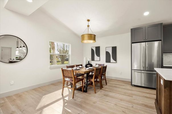 Dining room, Interior, Kitchen, Pendant Lights, Recessed Lighting, Stainless Steel Appliances, Wood Texture Flooring