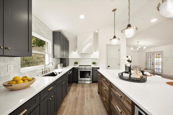 Interior, Kitchen, Pendant Lights, Recessed Lighting, Stainless Steel Appliances, Wood Texture Flooring