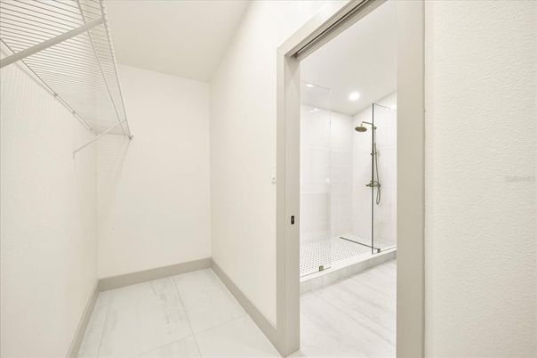 Bathroom, Glass Shower, Interior, Marble, Recessed Lighting, Walk-in Closets