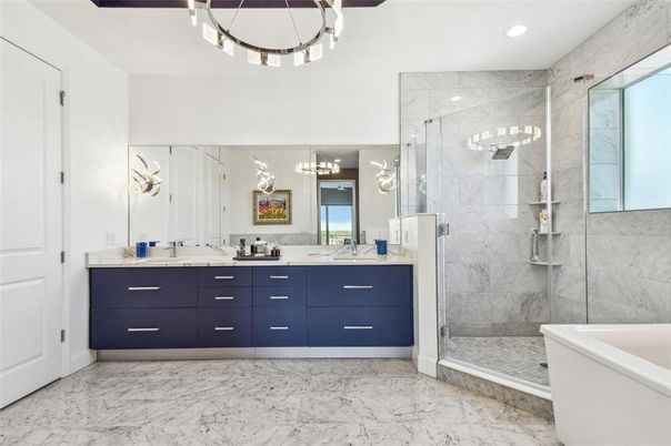 Bathroom, Dual Sink Vanities, Free Standing Baths, Glass Shower, Interior, Marble, Marble Walls, Recessed Lighting