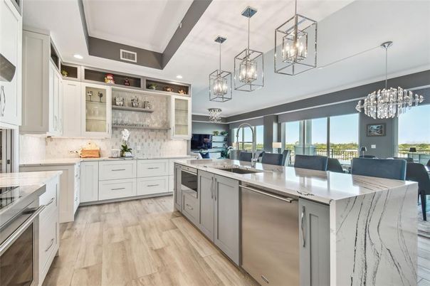 Chandelier, Interior, Kitchen, Pendant Lights, Recessed Lighting, Stainless Steel Appliances, Wood Texture Flooring