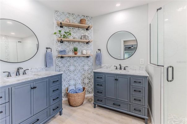Bathroom, Dual Sink Vanities, Glass Shower, Interior, Recessed Lighting, Wood Texture Flooring