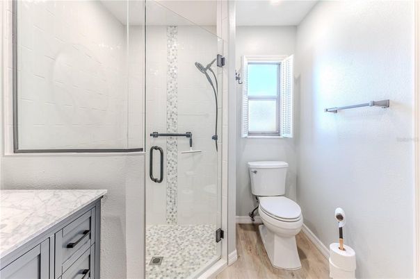 Bathroom, Glass Shower, Interior, Recessed Lighting, Wood Texture Flooring