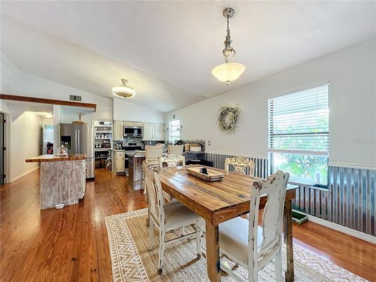 Dining room, Interior, Kitchen, Pendant Lights, Stainless Steel Appliances, Wood Texture Flooring