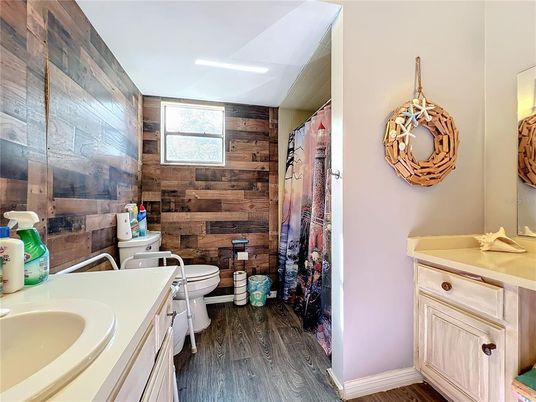 Bathroom, Dual Sink Vanities, Interior, Recessed Lighting, Wood Texture Flooring, Wooden Walls