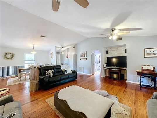 Dining room, Fireplace, Interior, Living room, Pendant Lights, Wood Texture Flooring