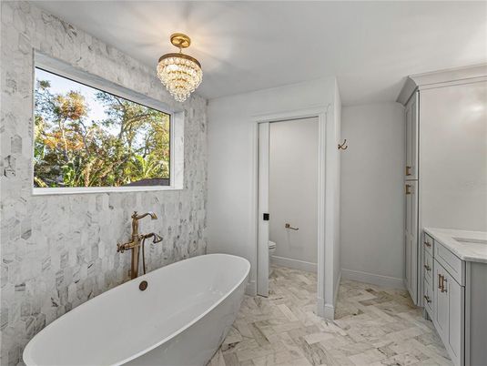 Bathroom, Chandelier, Free Standing Baths, Interior, Marble, Marble Walls