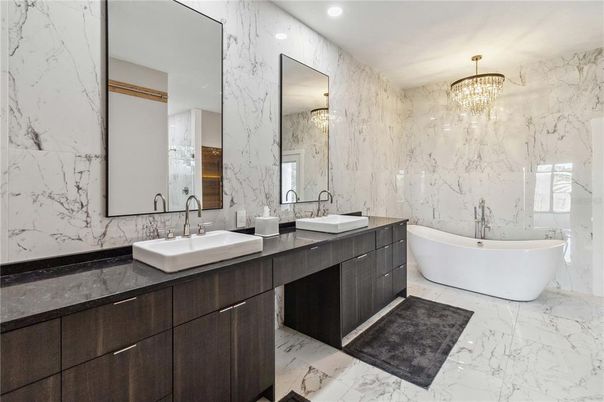 Bathroom, Chandelier, Dual Sink Vanities, Free Standing Baths, Interior, Marble, Marble Walls, Recessed Lighting