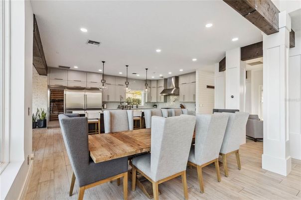 Dining room, Interior, Kitchen, Pendant Lights, Recessed Lighting, Stainless Steel Appliances, Wood Texture Flooring