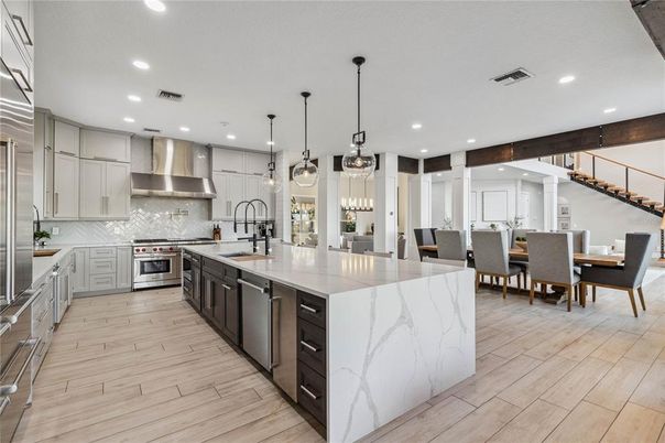 Dining room, Interior, Kitchen, Pendant Lights, Recessed Lighting, Stainless Steel Appliances, Wood Texture Flooring