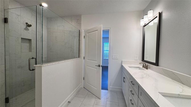 Bathroom, Dual Sink Vanities, Glass Shower, Interior, Marble, Marble Walls