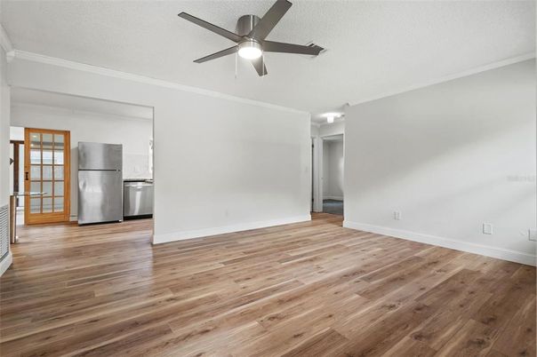 Empty room, Interior, Kitchen, Stainless Steel Appliances, Wood Texture Flooring
