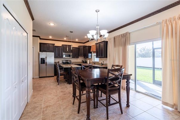 Chandelier, Dining room, Interior, Kitchen, Pendant Lights, Recessed Lighting, Stainless Steel Appliances