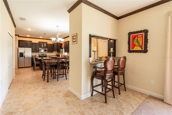 Chandelier, Dining room, Interior, Kitchen, Pendant Lights, Recessed Lighting, Stainless Steel Appliances