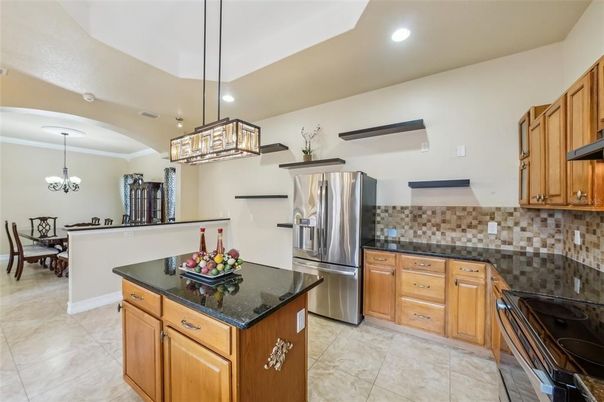 Chandelier, Dining room, Interior, Kitchen, Pendant Lights, Recessed Lighting, Stainless Steel Appliances