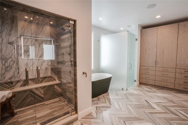 Bathroom, Free Standing Baths, Glass Shower, Interior, Marble Walls, Recessed Lighting