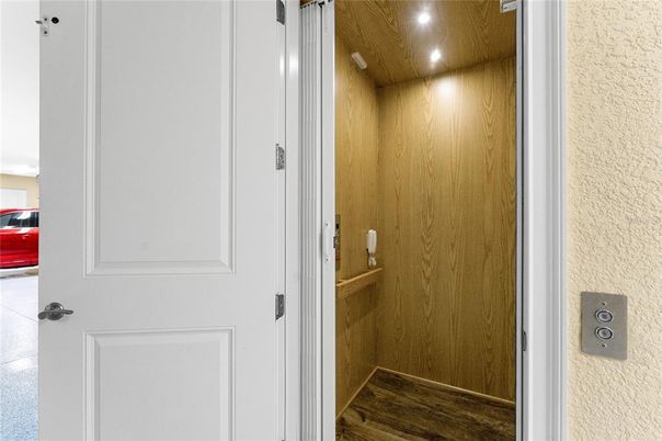 Elevator, Interior, Recessed Lighting, Wooden Ceilings, Wood Texture Flooring, Wooden Walls