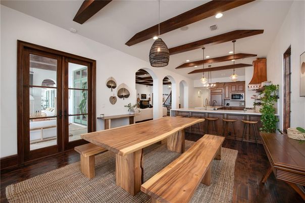 Dining room, Interior, Kitchen, Pendant Lights, Recessed Lighting, Stainless Steel Appliances, Wooden Beams, Wood Texture Flooring