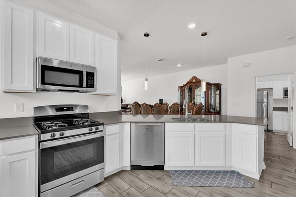 Interior, Kitchen, Pendant Lights, Recessed Lighting, Stainless Steel Appliances, Wood Texture Flooring