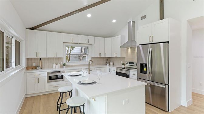 Interior, Kitchen, Recessed Lighting, Stainless Steel Appliances, Wood Texture Flooring
