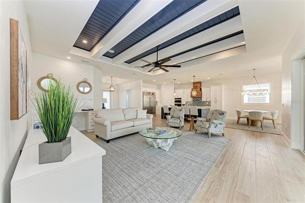 Dining room, Interior, Kitchen, Living room, Pendant Lights, Recessed Lighting, Stainless Steel Appliances, Wood Texture Flooring