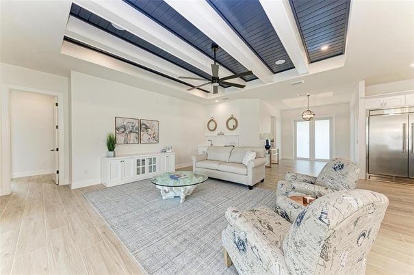 Interior, Living room, Pendant Lights, Recessed Lighting, Stainless Steel Appliances, Wood Texture Flooring