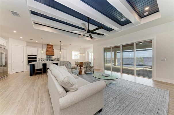 Dining room, Interior, Kitchen, Living room, Pendant Lights, Recessed Lighting, Stainless Steel Appliances, Wood Texture Flooring