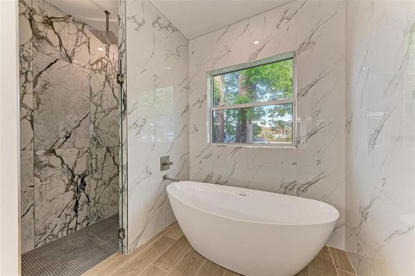 Bathroom, Free Standing Baths, Glass Shower, Interior, Marble Walls, Wood Texture Flooring