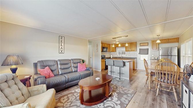 Dining room, Interior, Kitchen, Living room, Pendant Lights, Stainless Steel Appliances, Wood Texture Flooring