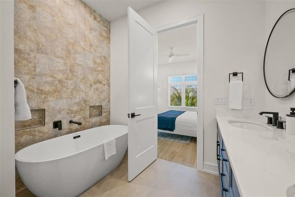 Bathroom, Bedroom, Dual Sink Vanities, Free Standing Baths, Interior, Wood Texture Flooring