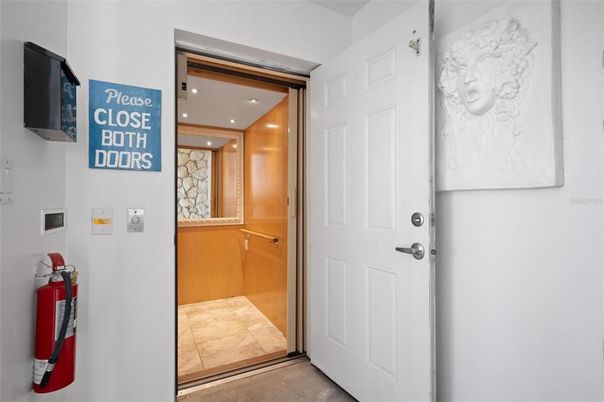 Elevator, Interior, Recessed Lighting, Wooden Walls