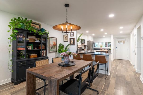 Dining room, Interior, Kitchen, Pendant Lights, Recessed Lighting, Stainless Steel Appliances, Wood Texture Flooring