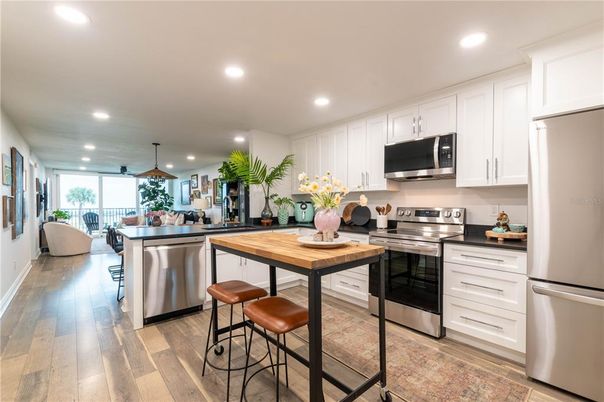 Interior, Kitchen, Pendant Lights, Recessed Lighting, Stainless Steel Appliances, Wood Texture Flooring