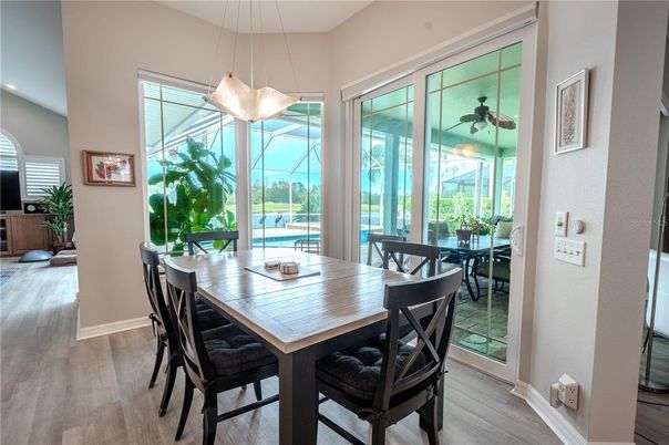 Dining room, Glass Ceilings, Interior, Pendant Lights, Recessed Lighting, Sun Room, Wood Texture Flooring