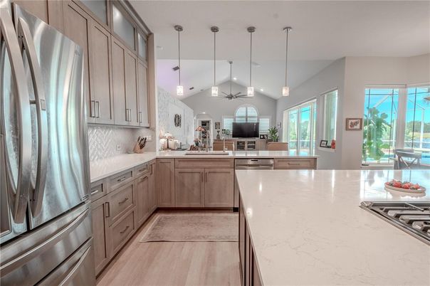 Interior, Kitchen, Pendant Lights, Recessed Lighting, Stainless Steel Appliances, Wood Texture Flooring