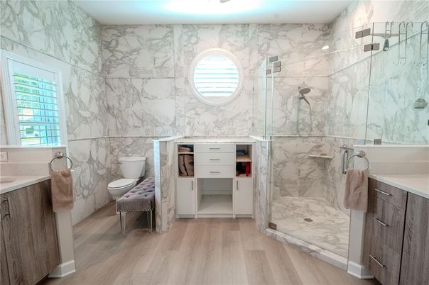 Bathroom, Glass Shower, Interior, Marble Walls, Wood Texture Flooring