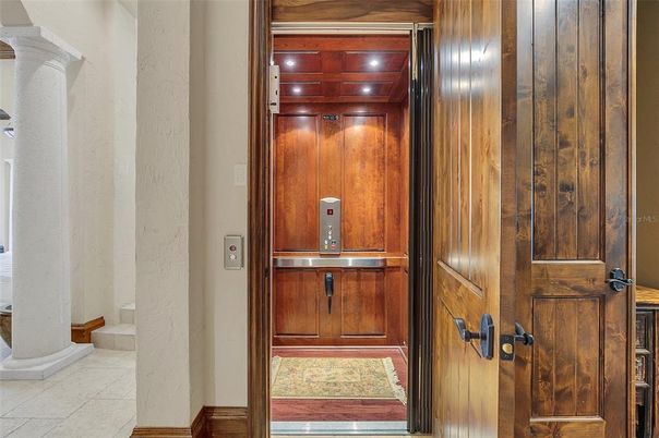 Elevator, Interior, Recessed Lighting, Wooden Ceilings, Wooden Walls