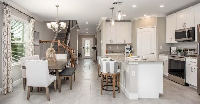 Chandelier, Dining room, Interior, Kitchen, Pendant Lights, Recessed Lighting, Stainless Steel Appliances